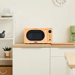 Nostalgia Retro 700W Countertop Microwave Oven, 0.7 Cu. Ft., Orange