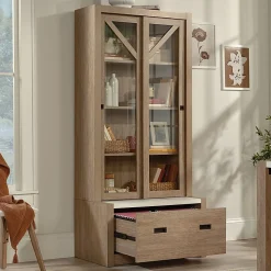 Sauder® Dixon City Library 4-Shelf Bookcase With Sliding Doors And Filing Drawer, Brushed Oak™/Pebble White™